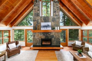 The living area boasts huge vaulted wood ceilings