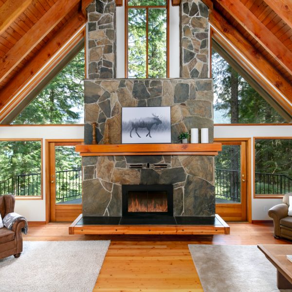 The living area boasts huge vaulted wood ceilings